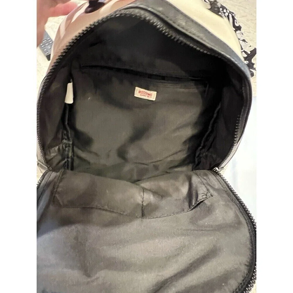 Merona white with black trim Faux leather backpack Lots of Pockets adjustable